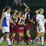 The Garnet celebrate the OT win at Widener.