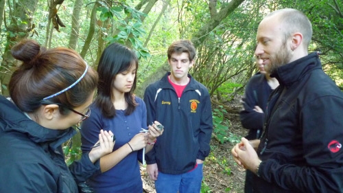 Students hold birds in the Crum while receiving a lesson.