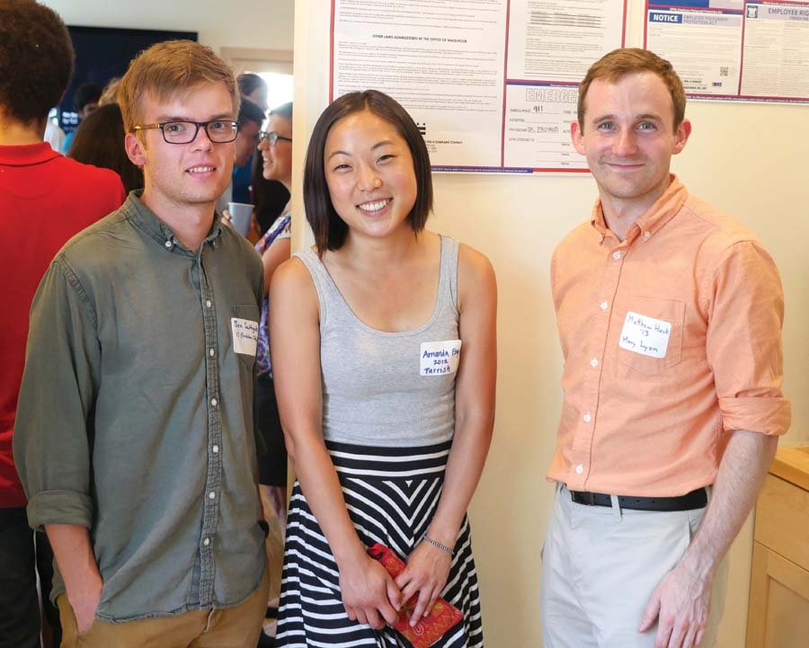 Three students smiling for a photo at TechChange