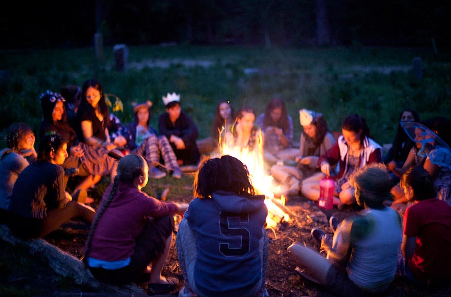 Make smores at a bonfire in Crum Meadow